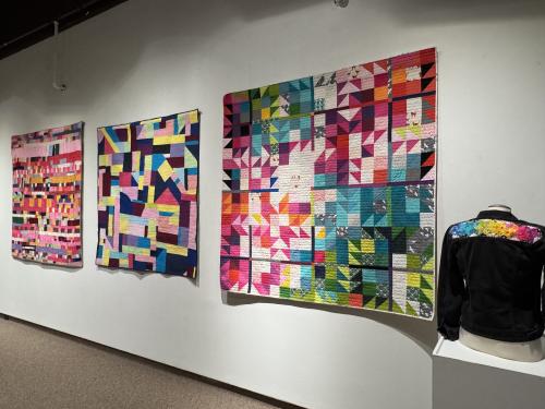 PEI MQG Exhibit - Quilts on wall