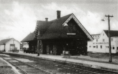Old black and white photo showing outside of Kensington Station 