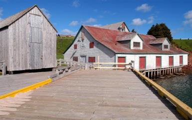 Exterior of Basin Head Fisheries Museum by the ocean 
