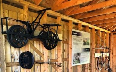 Image of a velocipede hanging on a wall